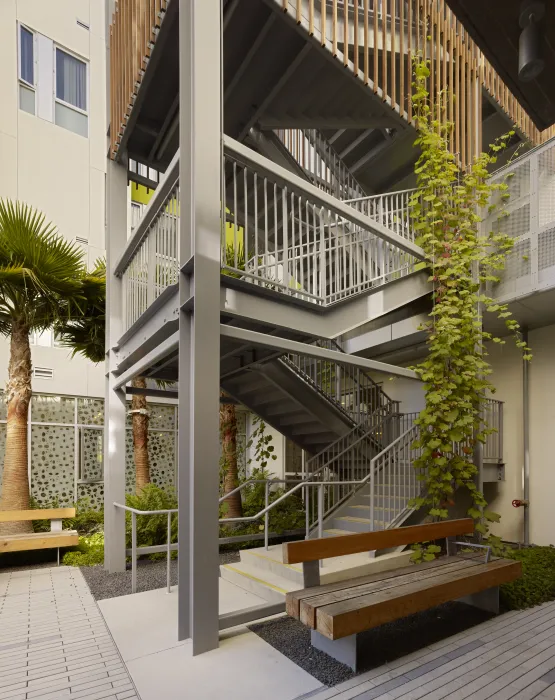 Open-air stair tower at Richardson Apartments in San Francisco.