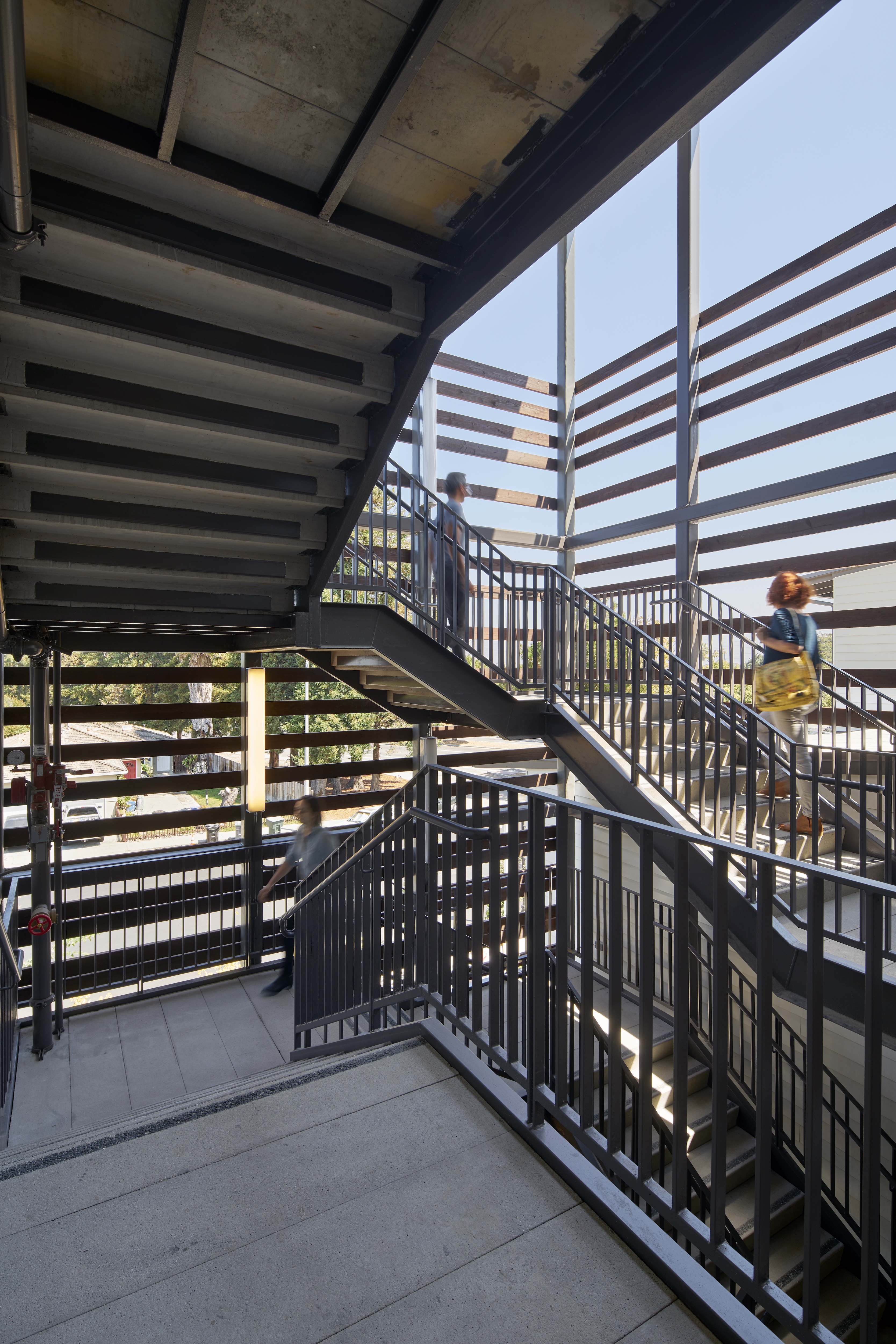 Exterior stairwell view of Onizuka Crossing Family Housing in Sunnyvale, California.