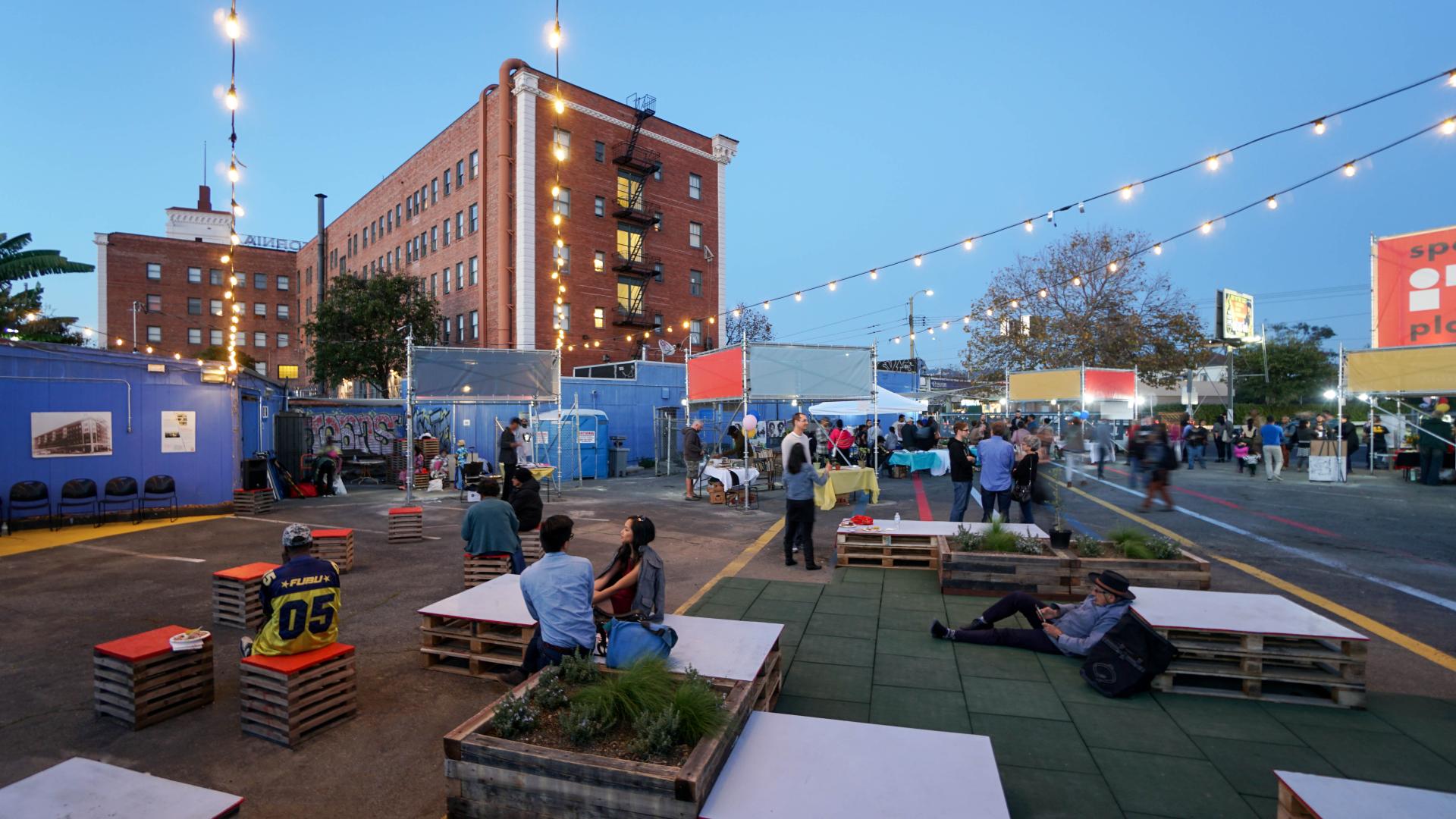 Pallet seating and garden beds at SPARC-It-Place on the future site for 34th and San Pablo Affordable Family Housing in Oakland, California.