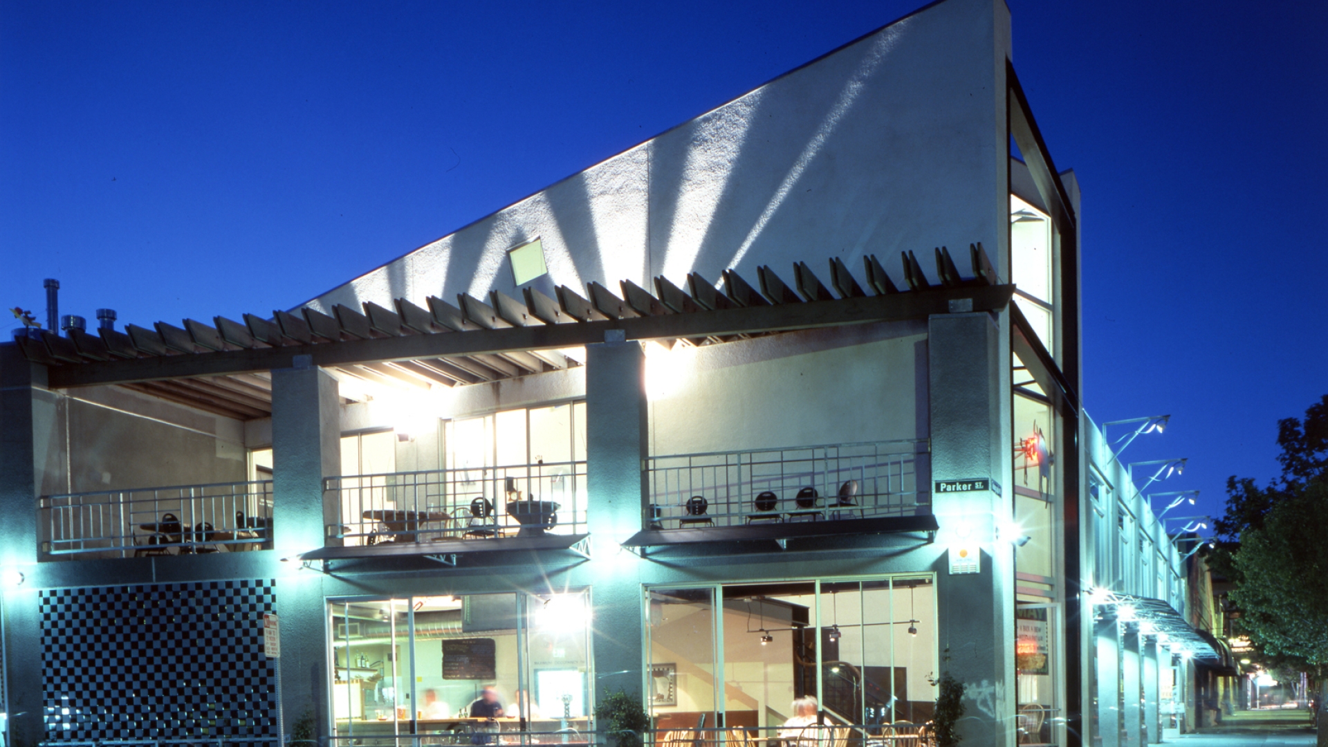 Exterior view of Bison Building & Brew Pub at night in Berkeley, California.