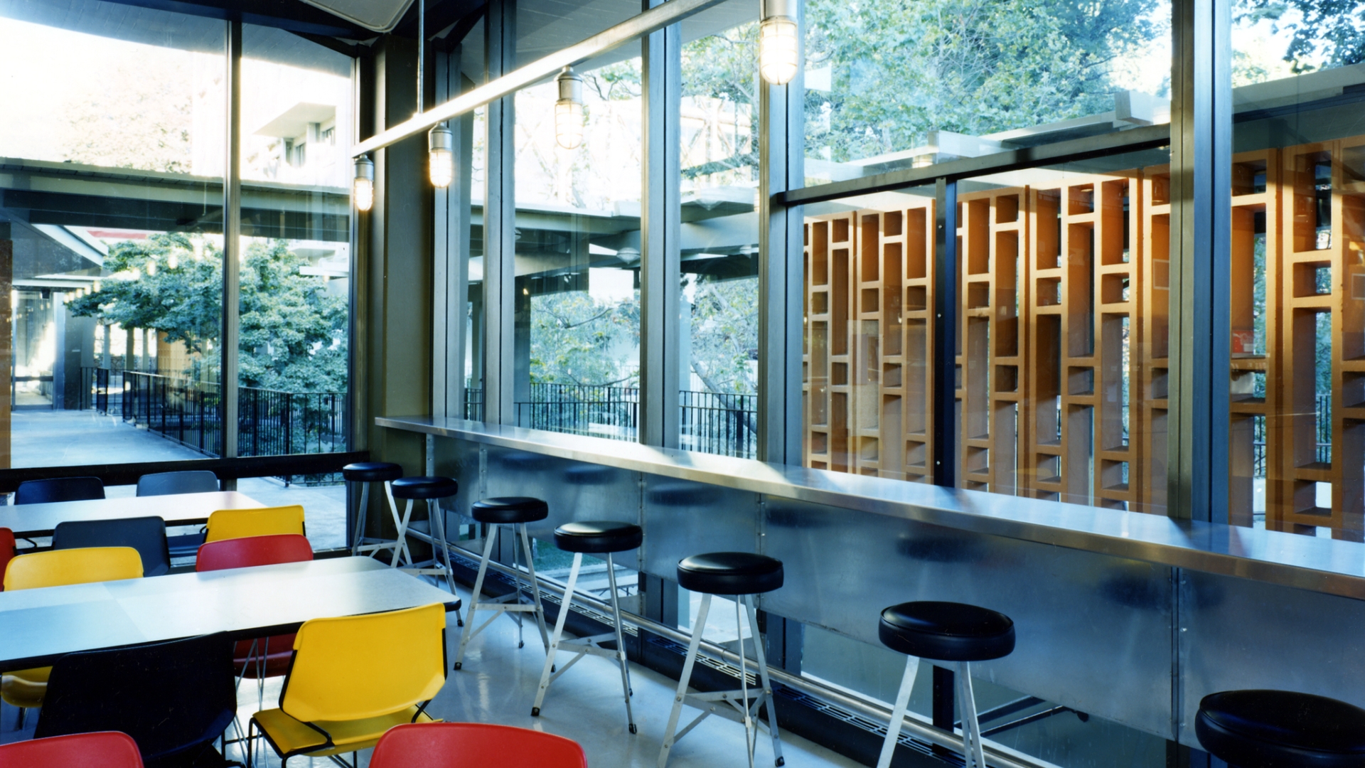 Interior view of U.C. Berkeley Dining Halls with counter and table seating.