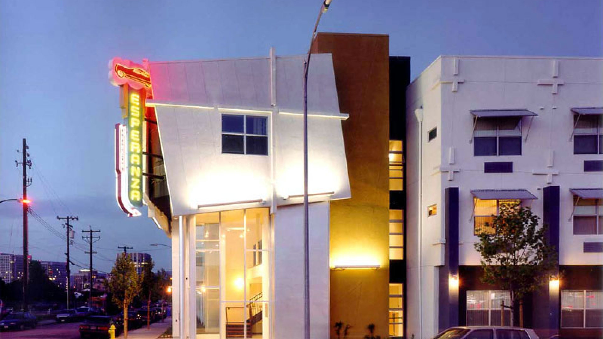 Exterior view of Pensione Esperanza at sunset in San Jose, California.