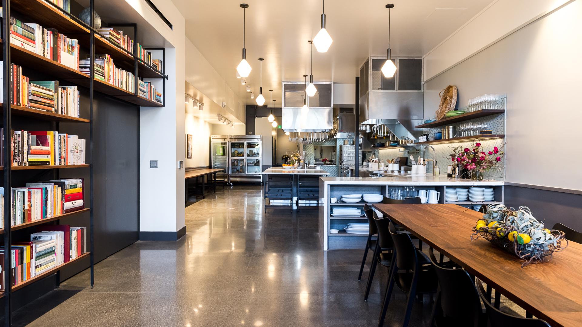Custom adjustable height table and bookshelf at Civic Kitchen in San Francisco.