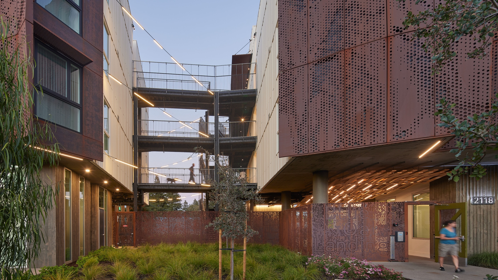 Exterior view of the open air bridge at Blue Oak Landing in Vallejo, California at dusk.