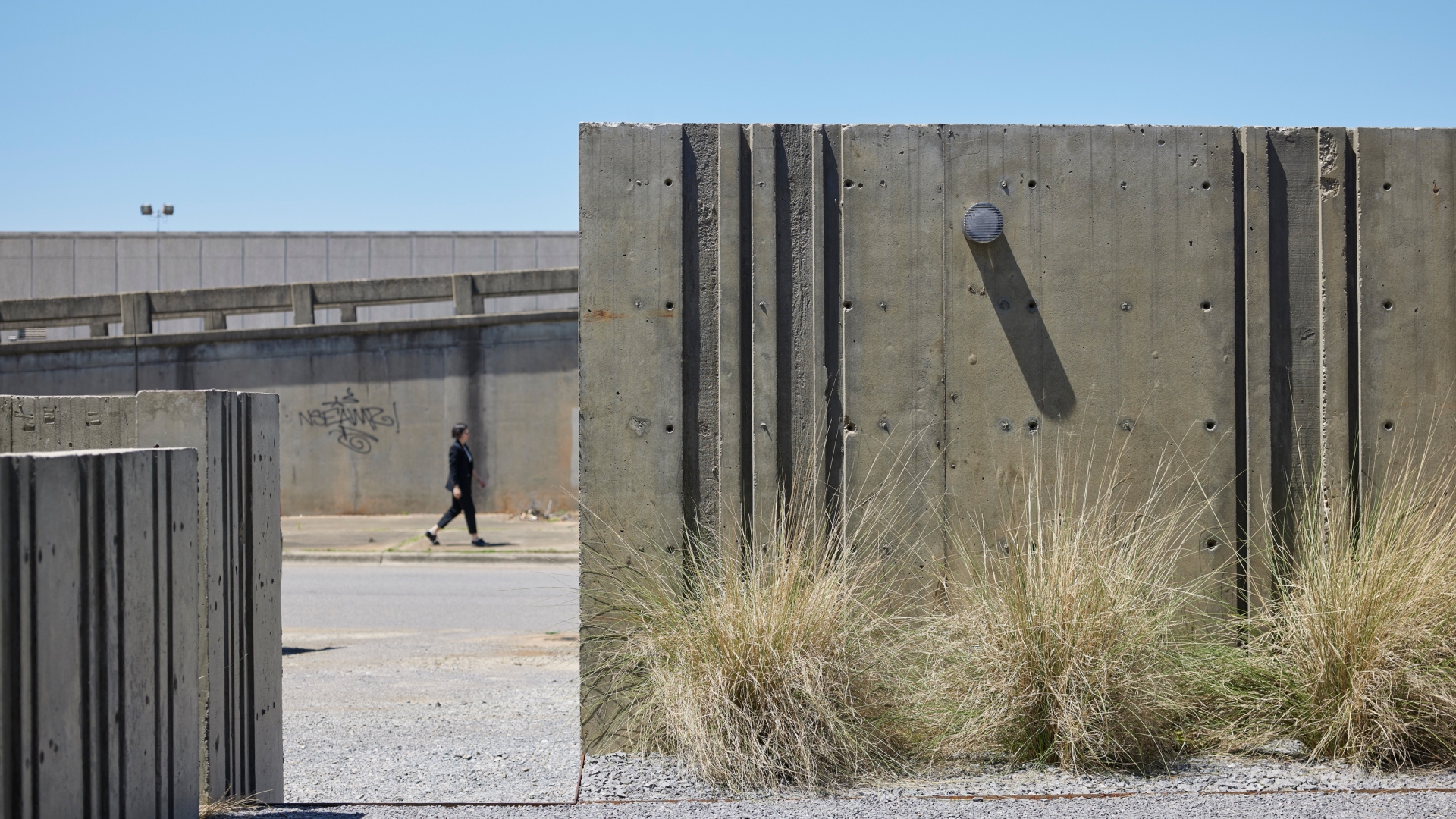 Textured concrete wall at Bandsaw Building.