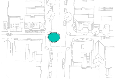 Sketch of a neighborhood with an aqua circle in an intersection representing the place of a water cistern.