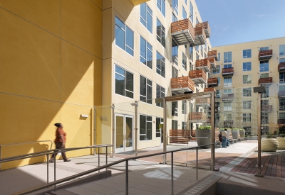 Exterior view of the courtyard entry to Rincon Green in San Francisco.