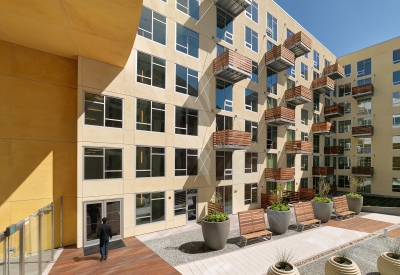 Courtyard with benches and planters at Rincon Green in San Francisco.