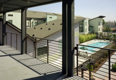 View of the pool and courtyard from the second level at Lenzen Square in San Jose, California.