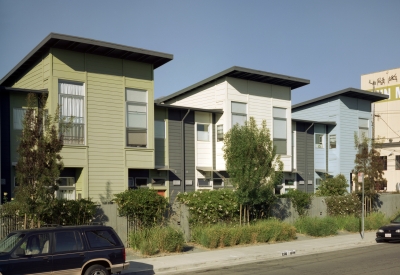 Exterior street view of Magnolia Row in West Oakland, California.
