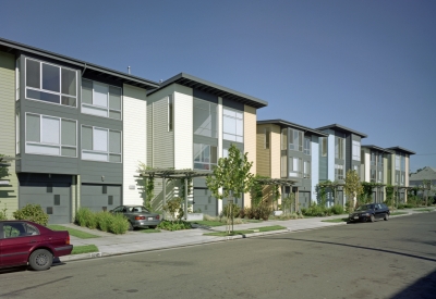 Exterior street view of Magnolia Row in West Oakland, California.