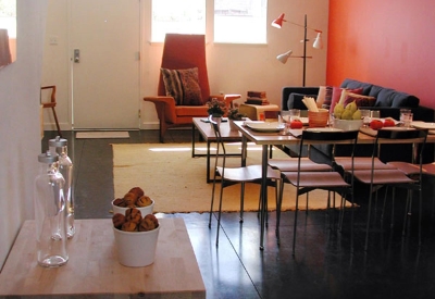 Ground level kitchen and living area inside a unit at Magnolia Row in West Oakland, California.