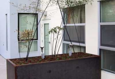 Corten planters at Folsom-Dore Supportive Apartments in San Francisco, California.