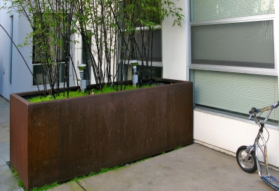 Corten planters at Folsom-Dore Supportive Apartments in San Francisco, California a few years after installation.