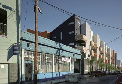 Exterior context view of Folsom-Dore Supportive Apartments in San Francisco, California.