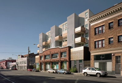 Exterior context view of Folsom-Dore Supportive Apartments in San Francisco, California.