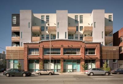 Exterior street view of Folsom-Dore Supportive Apartments in San Francisco, California.