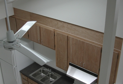 Kitchen inside of a unit at Folsom-Dore Supportive Apartments in San Francisco, California.