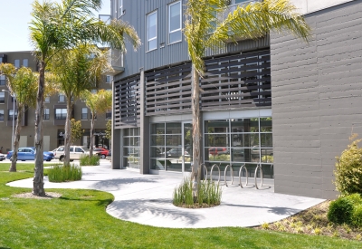 Greenery and bike parking at 888 Seventh Street in San Francisco.