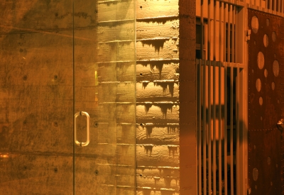 Detail of the entrance door and concrete at 888 Seventh Street in San Francisco.