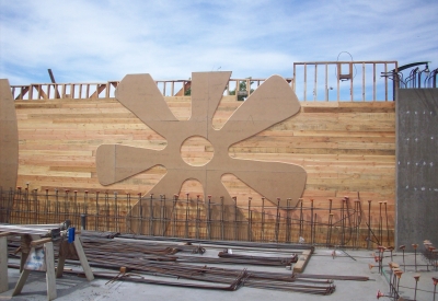 Flower shaped symbol being place during construction of Armstrong Place Senior in San Francisco.