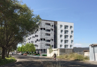 Rendered street view of Coliseum Place, affordable housing in Oakland, Ca