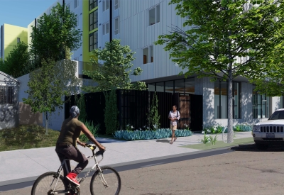 Rendered street view of the courtyard at Coliseum Place, affordable housing in Oakland, Ca