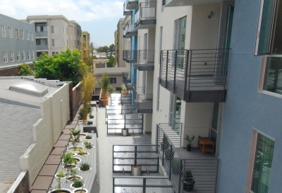 Ground floor units shared courtyard at 200 Second Street in Oakland, California.