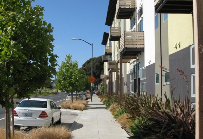 Sidewalk along townhomes at West End Commons in Oakland, Ca.