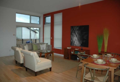 Living room inside a townhome at West End Commons in Oakland, Ca.