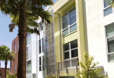 View of townhouses along mews at Blue Star Corner in Emeryville, Ca.