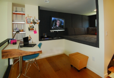 Entertainment room inside a unit at Blue Star Corner in Emeryville, Ca.