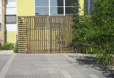 Wood and steel fence at Blue Star Corner in Emeryville, Ca.