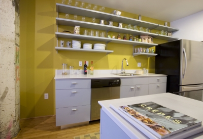 Interior view of a loft unit kitchen at Pacific Cannery Lofts in Oakland, California.