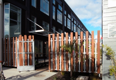 Gate that leads to pedestrian passage at Pacific Cannery Lofts in Oakland, California.