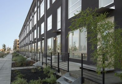 Ground floor patios at Pacific Cannery Lofts in Oakland, California.