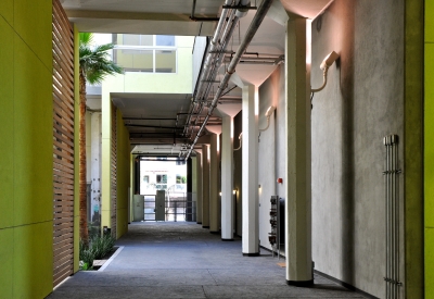 Looking down the ground floor open hallway at Pacific Cannery Lofts in Oakland, California.