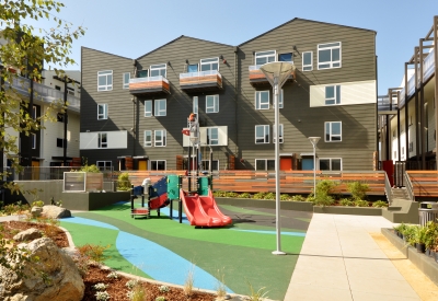 Large courtyard with children's play area at Armstrong Place in San Francisco.