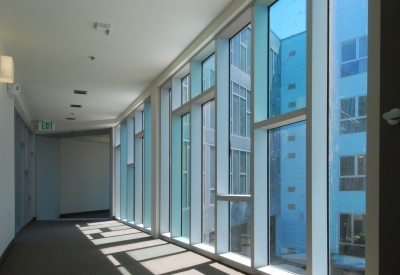 Sunlight shines through custom windows inside Crescent Cove in San Francisco.