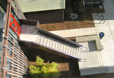 View from above of stairs at Ironhorse at Central Station in Oakland, California.