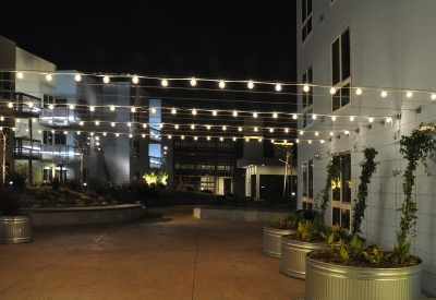 Courtyard at night at Ironhorse at Central Station in Oakland, California.