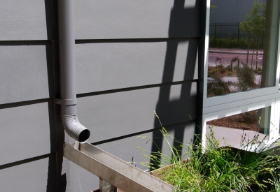 Downspout connection at Tassafaronga Village in East Oakland, CA.