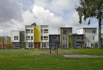 View of townhouses from the public park at Tassafaronga Village in East Oakland, CA. 