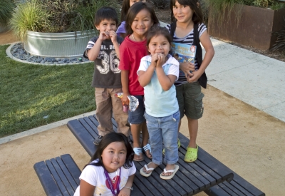 Children playing at Tassafaronga Village in East Oakland, CA. 