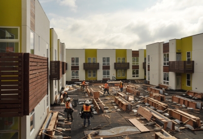 Apartment building under construction at Tassafaronga Village in East Oakland, CA.