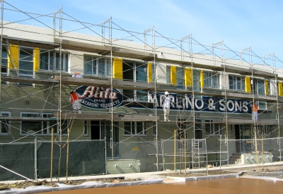 The pasta factory renovation included a refresh of the original signage at Tassafaronga Village in East Oakland, CA.. 