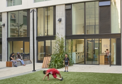 Children playing in the Courtyard of 222 Taylor Street, affordable housing in San Francisco