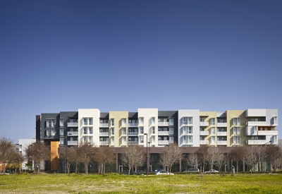 Exterior view from the adjacent park of Station Center Family Housing in Union City, Ca.