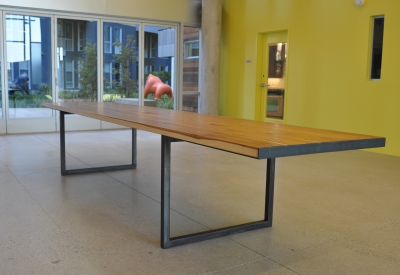Custom community room table at Station Center Family Housing in Union City, Ca