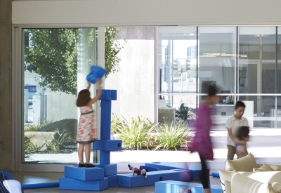 Community room looking out into the courtyard in Rivermark in Sacramento, Ca.